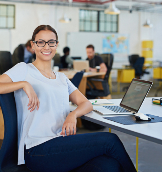 Woman, laptop and portrait in office for company career, online planning and creative research project for web. Female professional designer, smile and tech for email internet in coworking space.